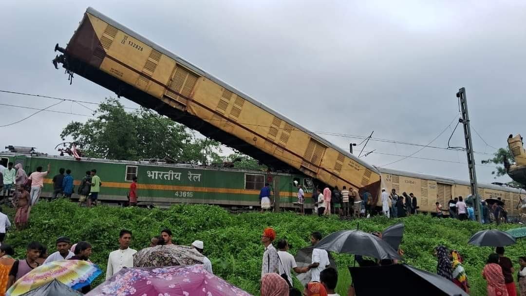 <p>Preliminary photos and videos of the collision showed a pile-up of train compartments in Phansidewa district with one nearly vertical in the air</p>