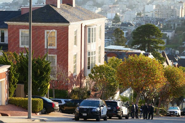 Investigators gathered outside the Pelosi home in San Francisco the morning after Paul Pelosi was attacked in October 2022.