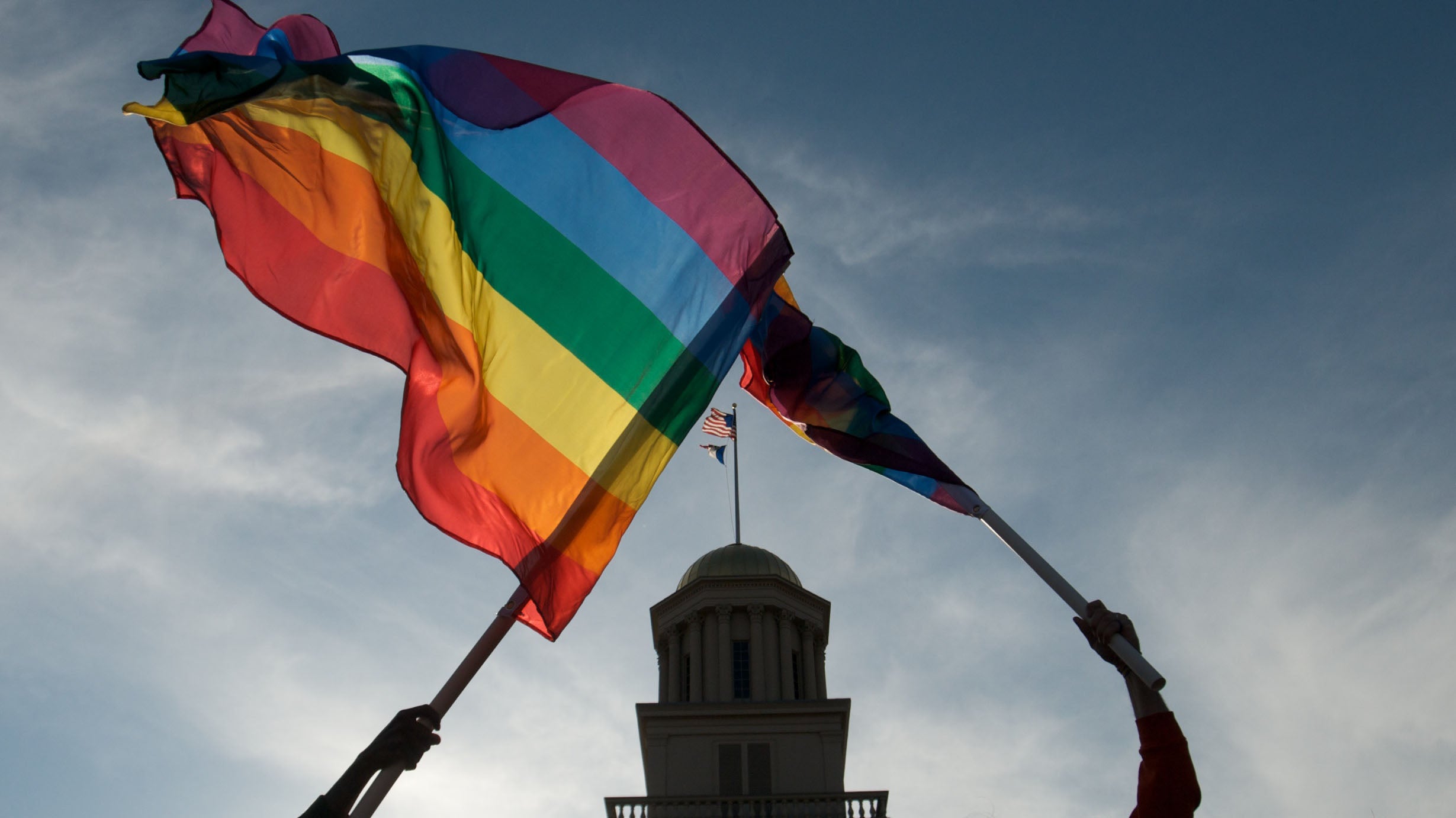 IOWA CITY, IOWA - APRIL 3: Gay, lesbian and transgender activists react to the unanimous decision by the Iowa Supreme Court earlier in the day recognizing same sex marriage as a civil right during a celebration on April 3, 2009 at the University of Iowa in Iowa City, Iowa. (Photo by David Greedy/Getty Images)