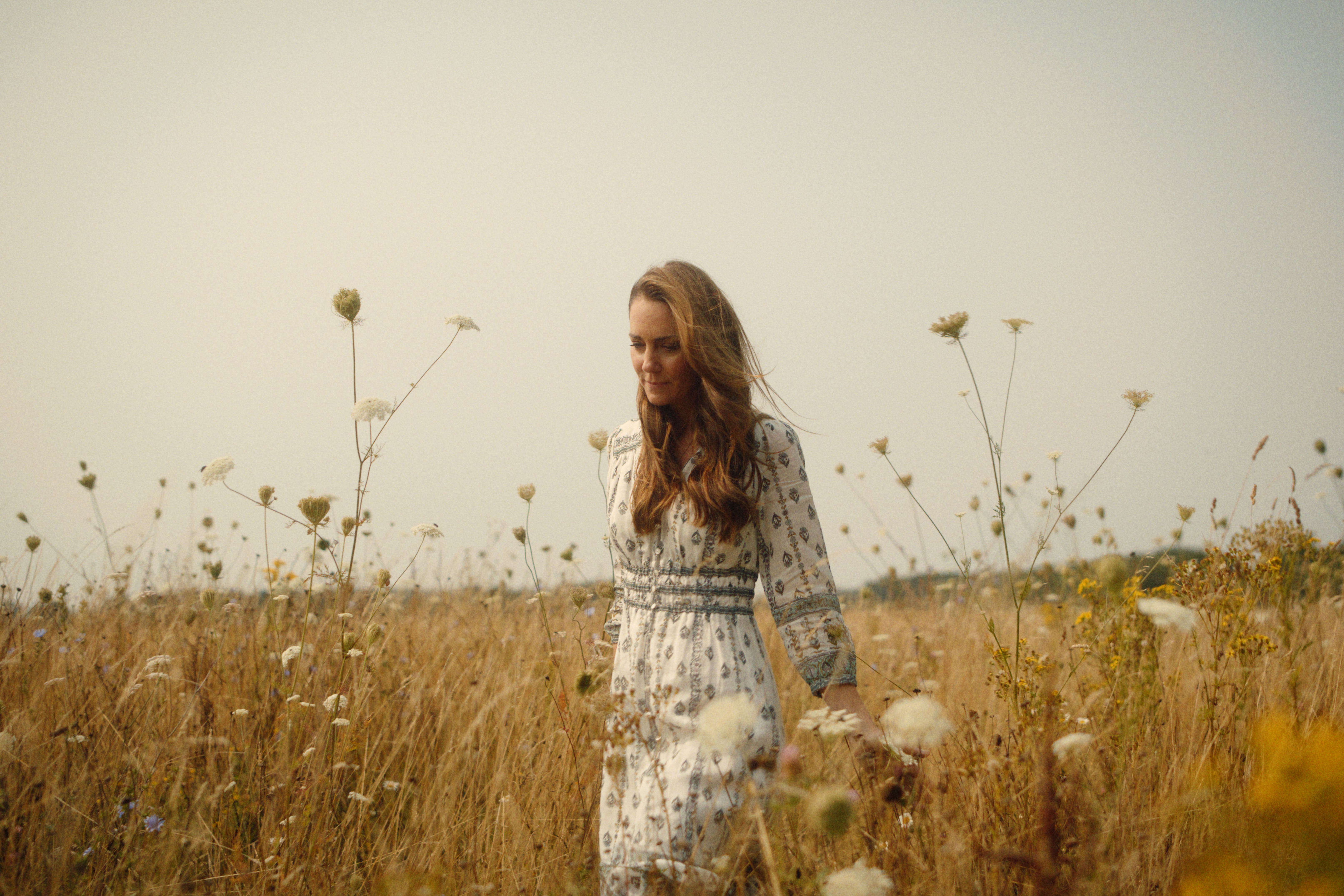 <p>The Princess of Wales is seen walking through a meadow in the video announcing the completion of her cancer treatment</p>