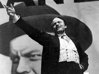 Orson Welles, film director, actor, and producer as Charles Foster Kane in the film "Citizen Kane" (1941) which he wrote, produced, directed and starred in. The film is based on the life of newspaper tycoon William Randolph Hearst.