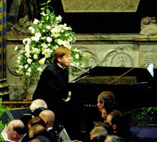 Elton John performing at the funeral of Princess Diana