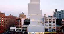 The New Museum of Contemporary Art in New York City, designed by the Japanese architecture firm SANAA (Sejima and Nishizawa and Associates) and opened in 2007. Attached to the facade is Swiss artist Ugo Rondinone's sculpture installation Hell, Yes! (2001)