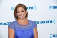 A photo of Mary Lou Retton posing for a photo outside of SiriusXM's studios.