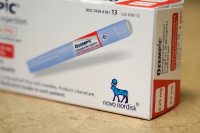 A photo of a box of Ozempic at an angle, showing the Novo Nordisk logo.