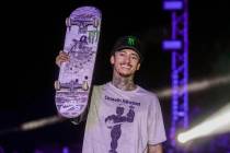 Nyjah Huston of the United States celebrates on the podium after winning the men finals at the ...