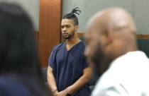 Gary Jackson, right, a brother of a murder victim Destiny Nicole Jackson, delivers his victim i ...