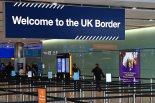 Article thumbnail: UK border signage is pictured at the passport control in Arrivals in Terminal 2 at Heathrow Airport in London on July 16, 2019 (Photo by Daniel LEAL / AFP) (Photo by DANIEL LEAL/AFP via Getty Images)