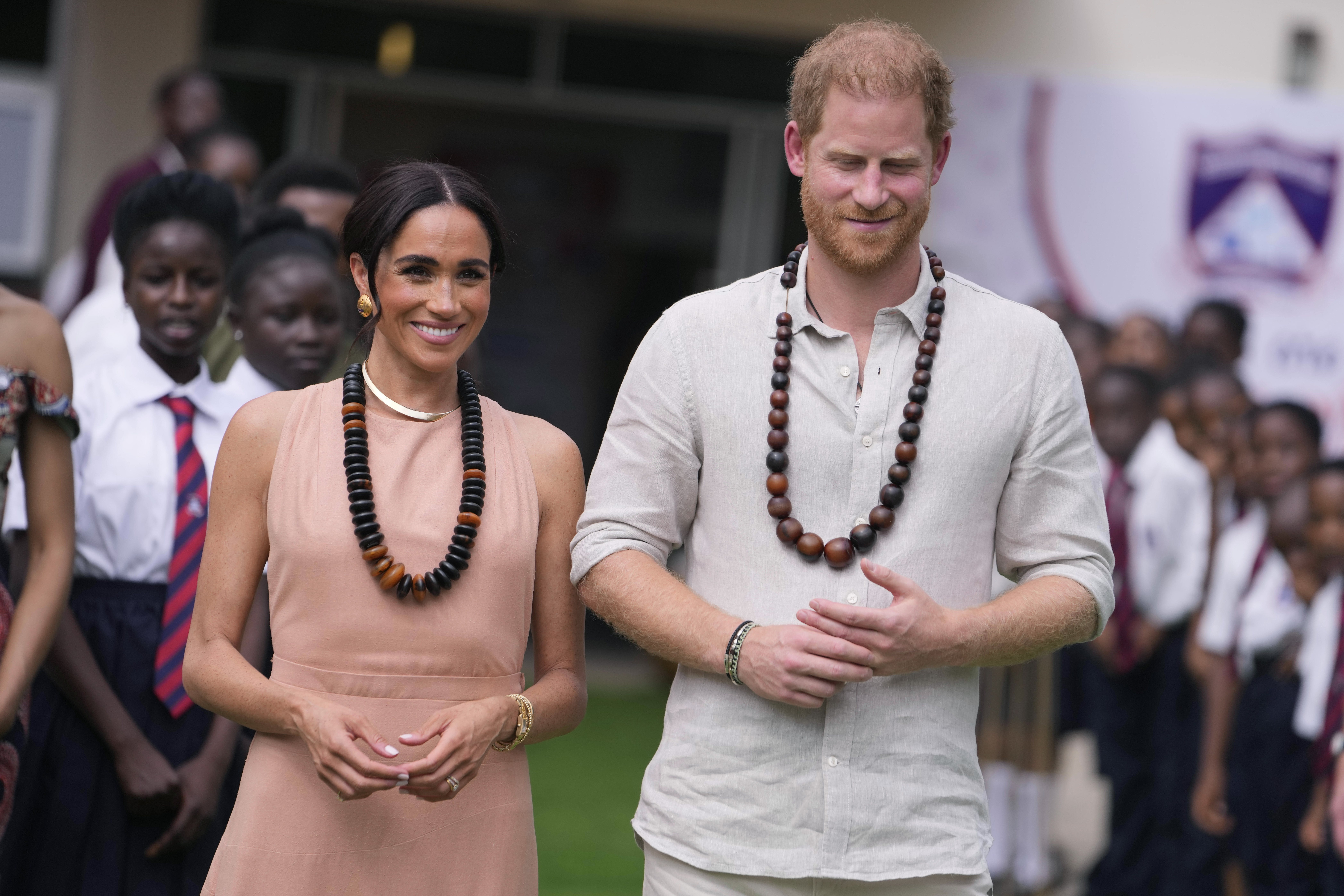 Harry & Meghan tease MORE 'faux royal' tours as they heap praise on Nigeria