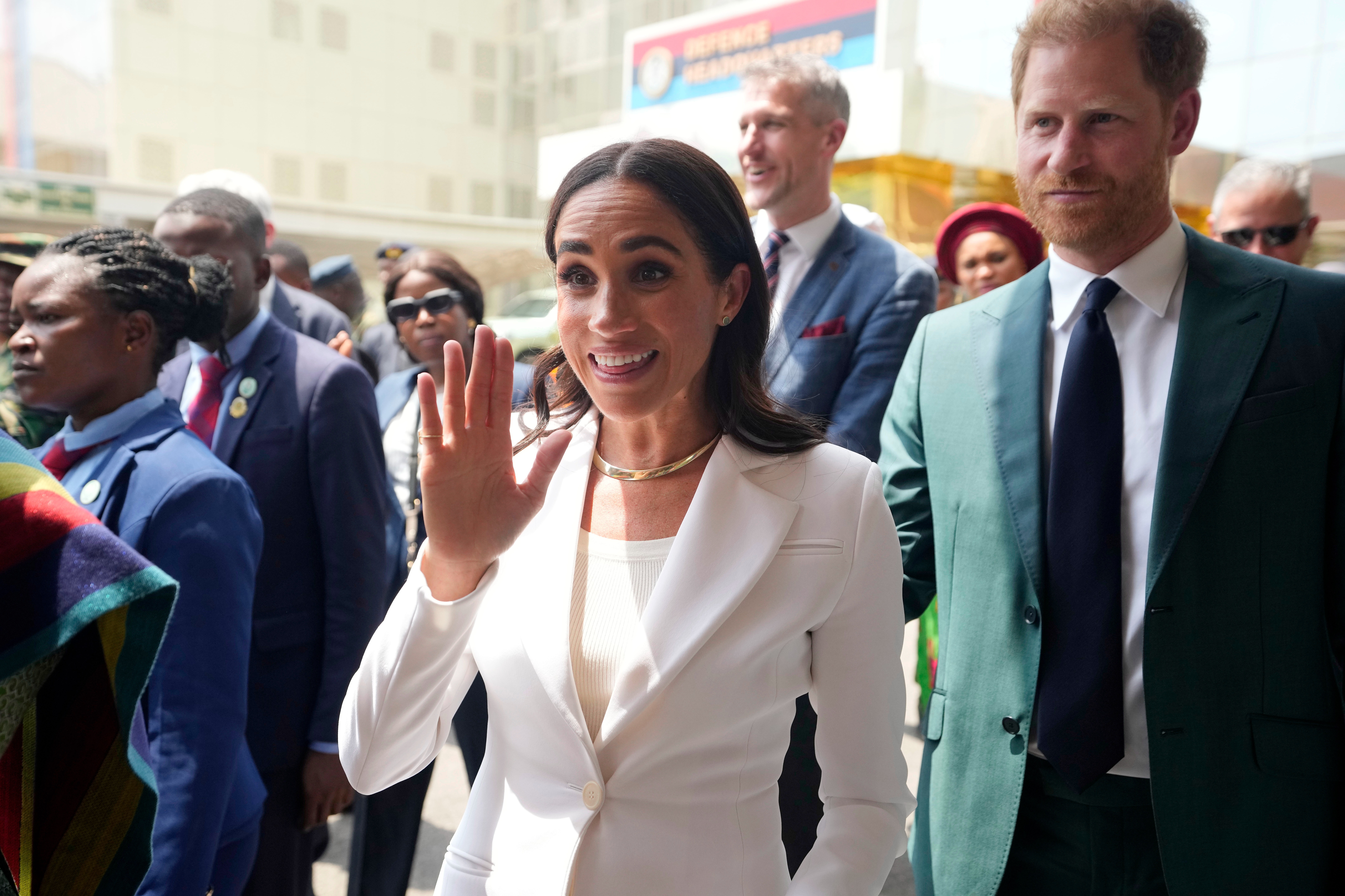 Meghan & Harry arrive at Nigeria's defence HQ on 'faux-royal' tour