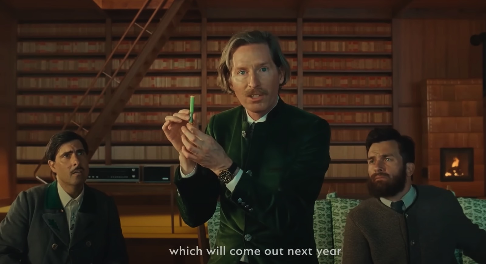 Wes Anderson in his Montblanc ad holding the pen he created.