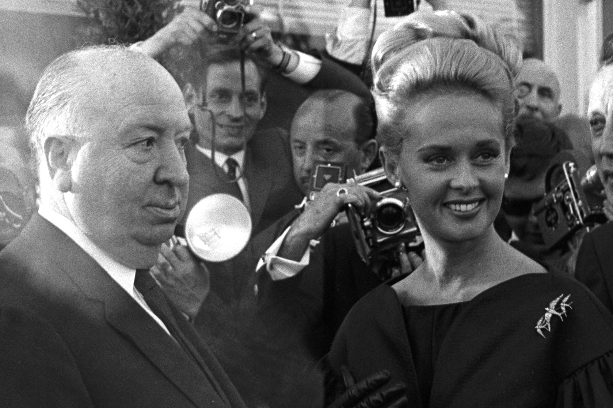 Alfred Hitchcock and Tippi Hedren in 1963. Hitchcock warned Hedren's “The Birds” castmates not to socialize with or “touch The Girl”