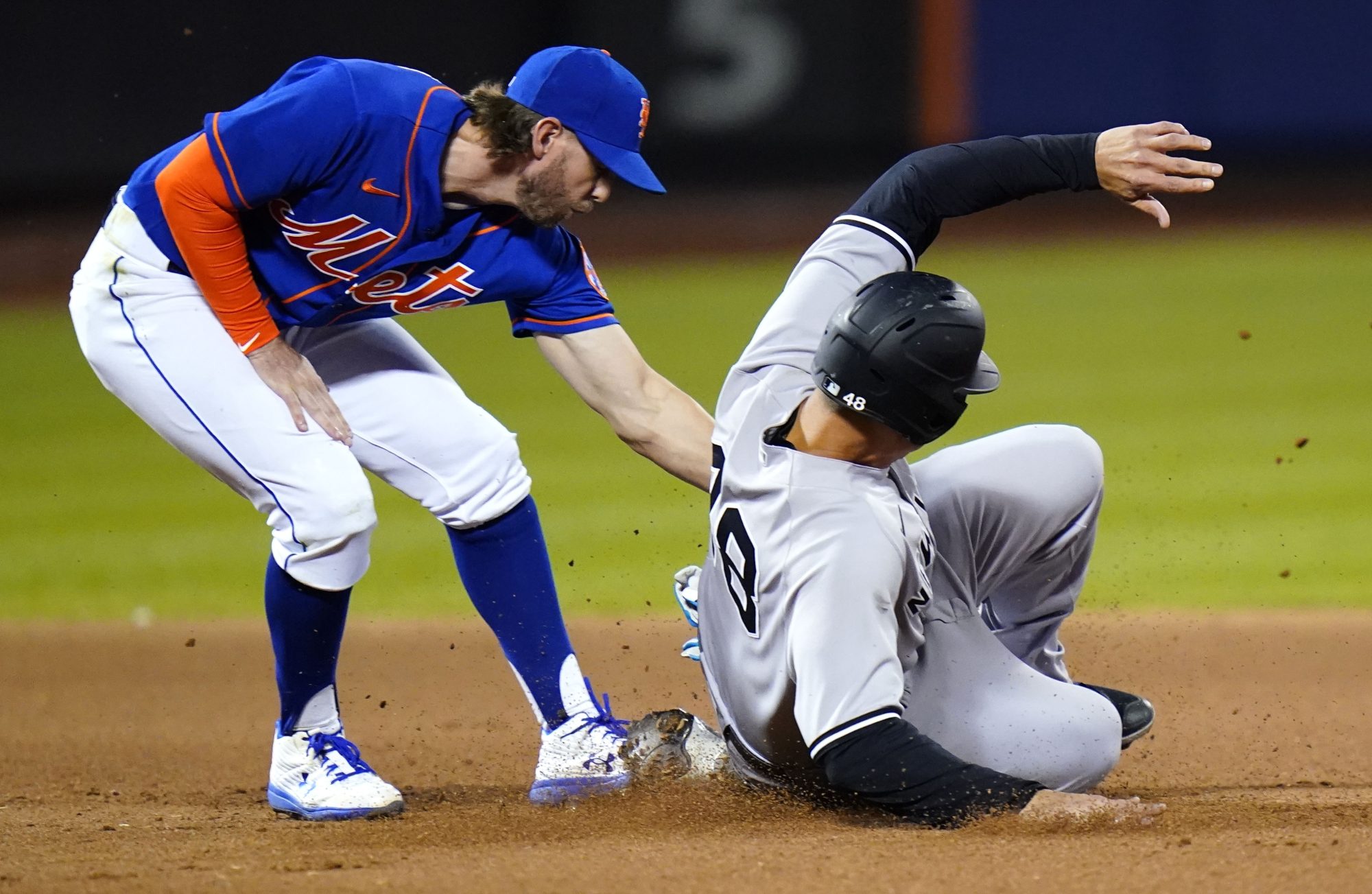 Anthony Rizzo is tagged out by Jeff McNeil after attempting a double steal in the seventh inning of the Yankees' 6-3 loss to the Mets.