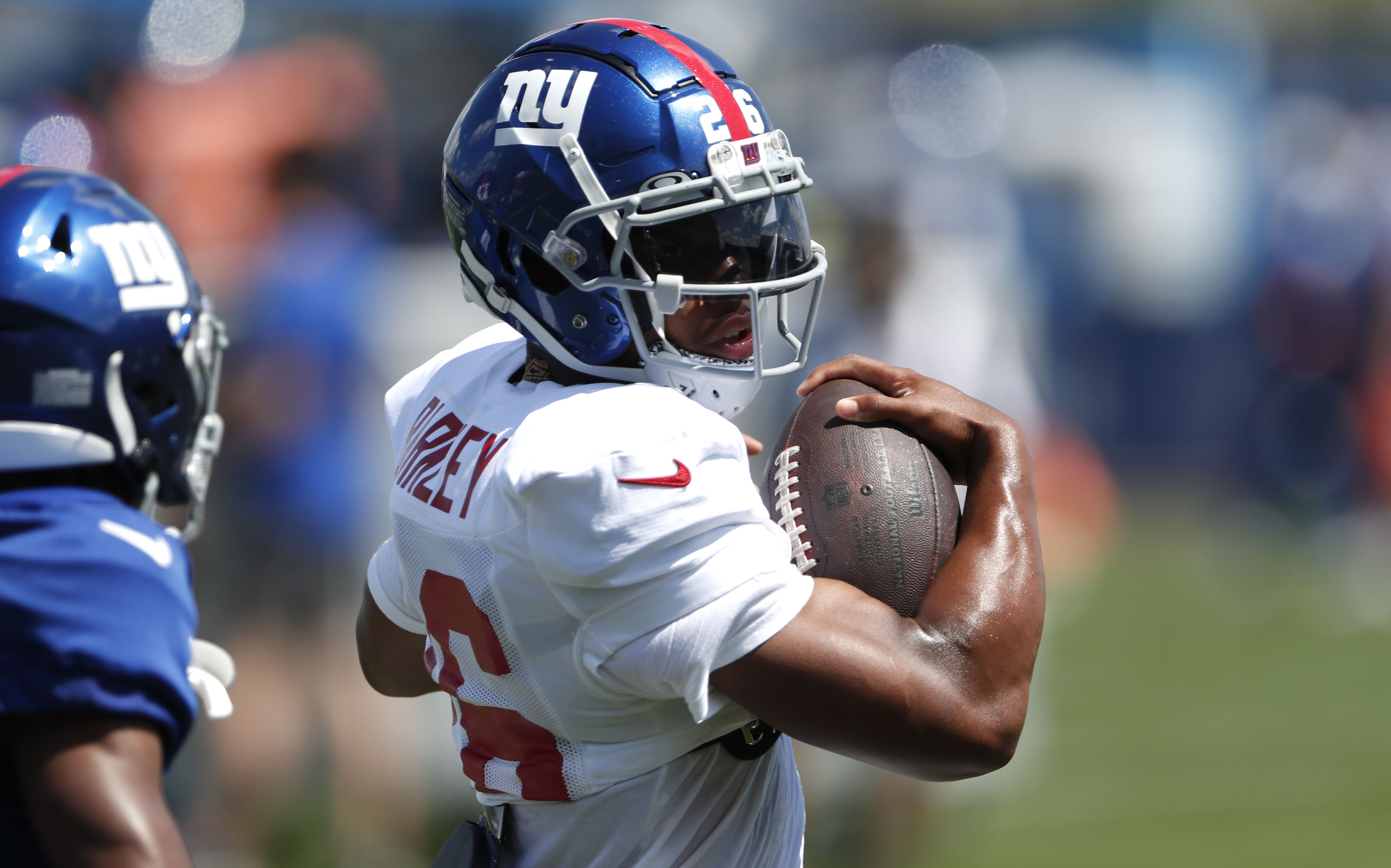 Saquon Barkley runs with the ball during a recent Giants practice.