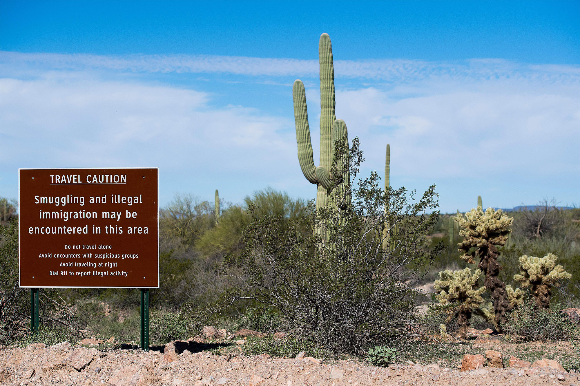 A sign warns against illegal smuggling in Organ Pipe Cactus National Monument near Lukeville, Arizona,