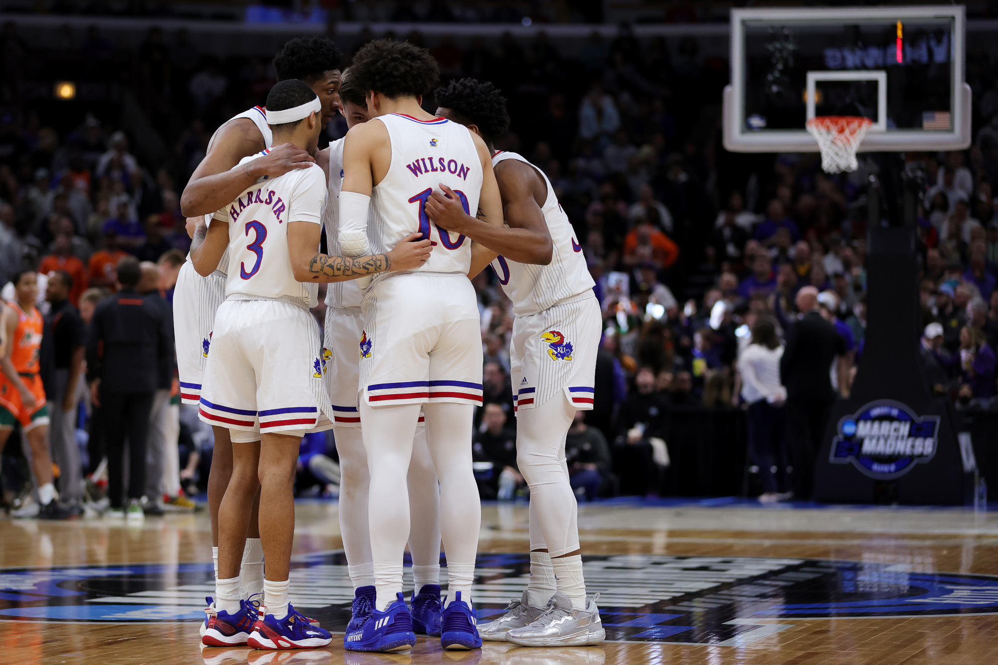 The Kansas Jayhawks huddle before the Elite Eight round game of the 2022 NCAA Men's Basketball Tournament against the Miami Hurricanes at United Center on March 27, 2022 in Chicago, Illinois.