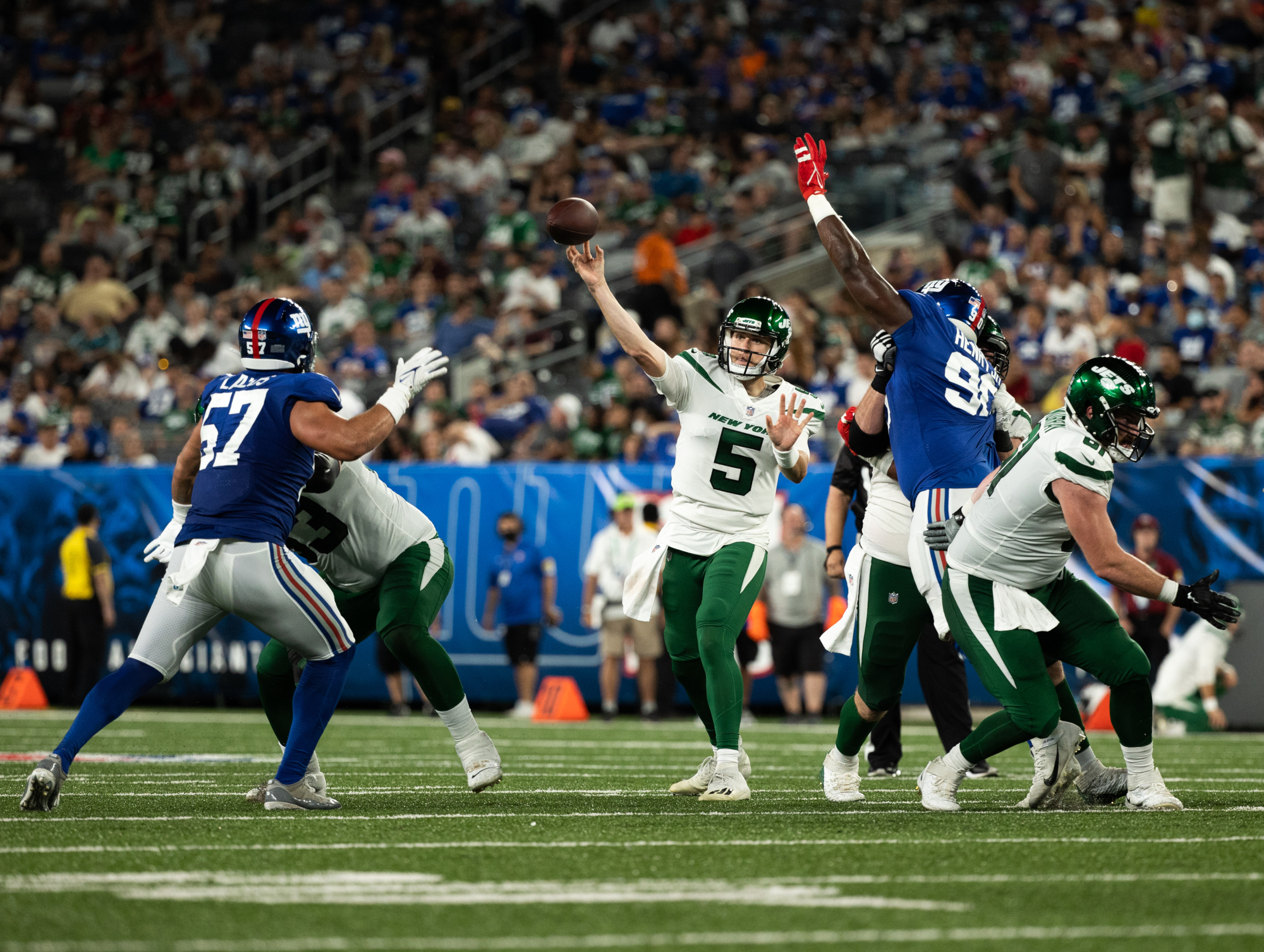 Mike White #5 of the New York Jets throws a pass during the third quarter of a preseason game against the New York Giants at MetLife Stadium.