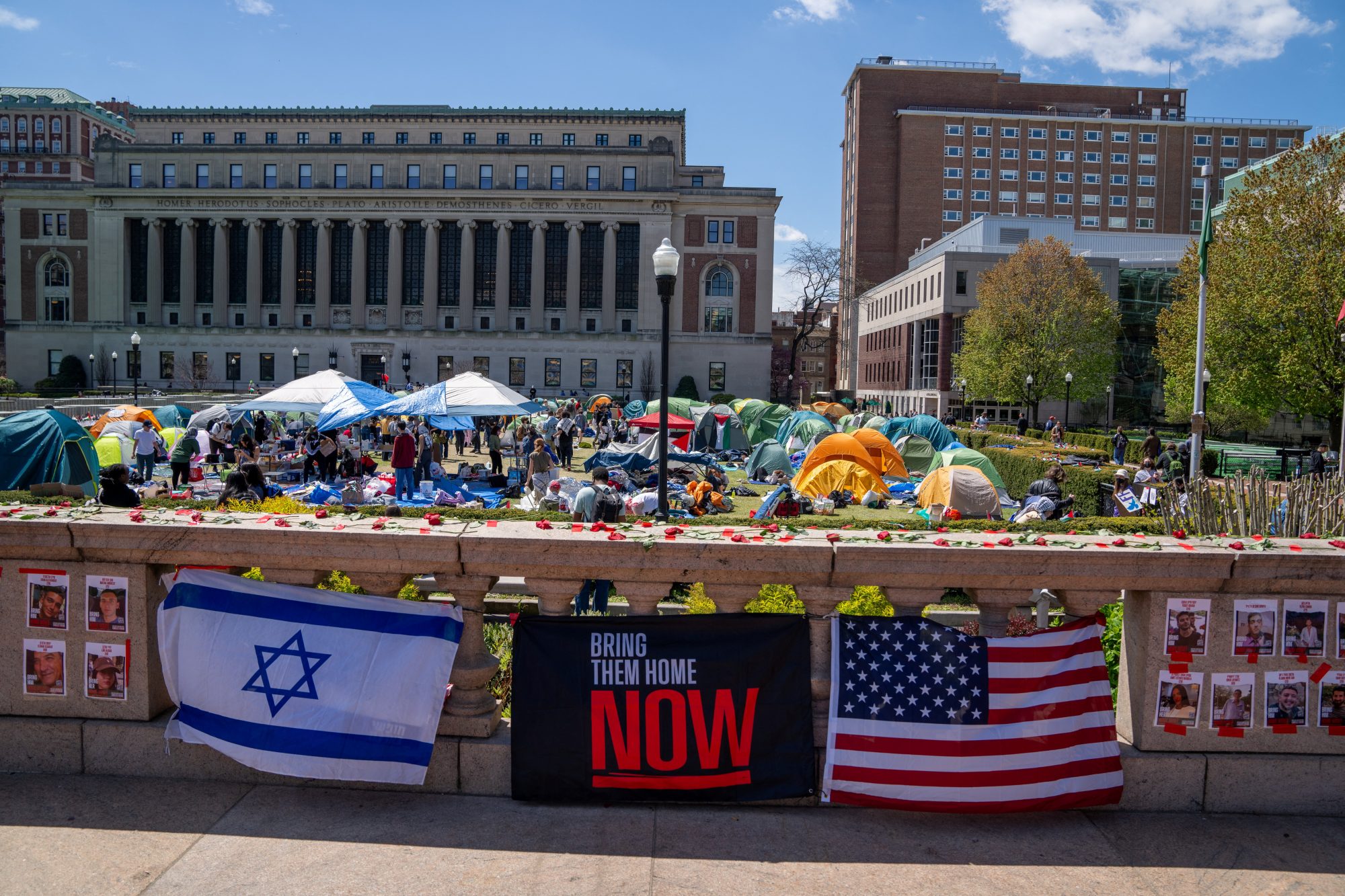 Signs in support of Israel are posted on campus near the encampment where students are protesting in support of Palestinians at Columbia University.