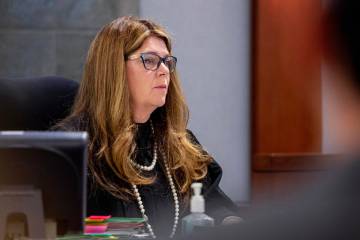 Judge Cynthia Cruz listens to defense attorney Craig Mueller on behalf of Nathaniel Postelle II ...