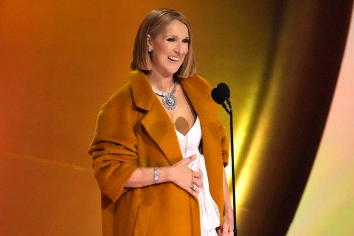 Celine Dion presents the award for album of the year during the 66th annual Grammy Awards on Su ...