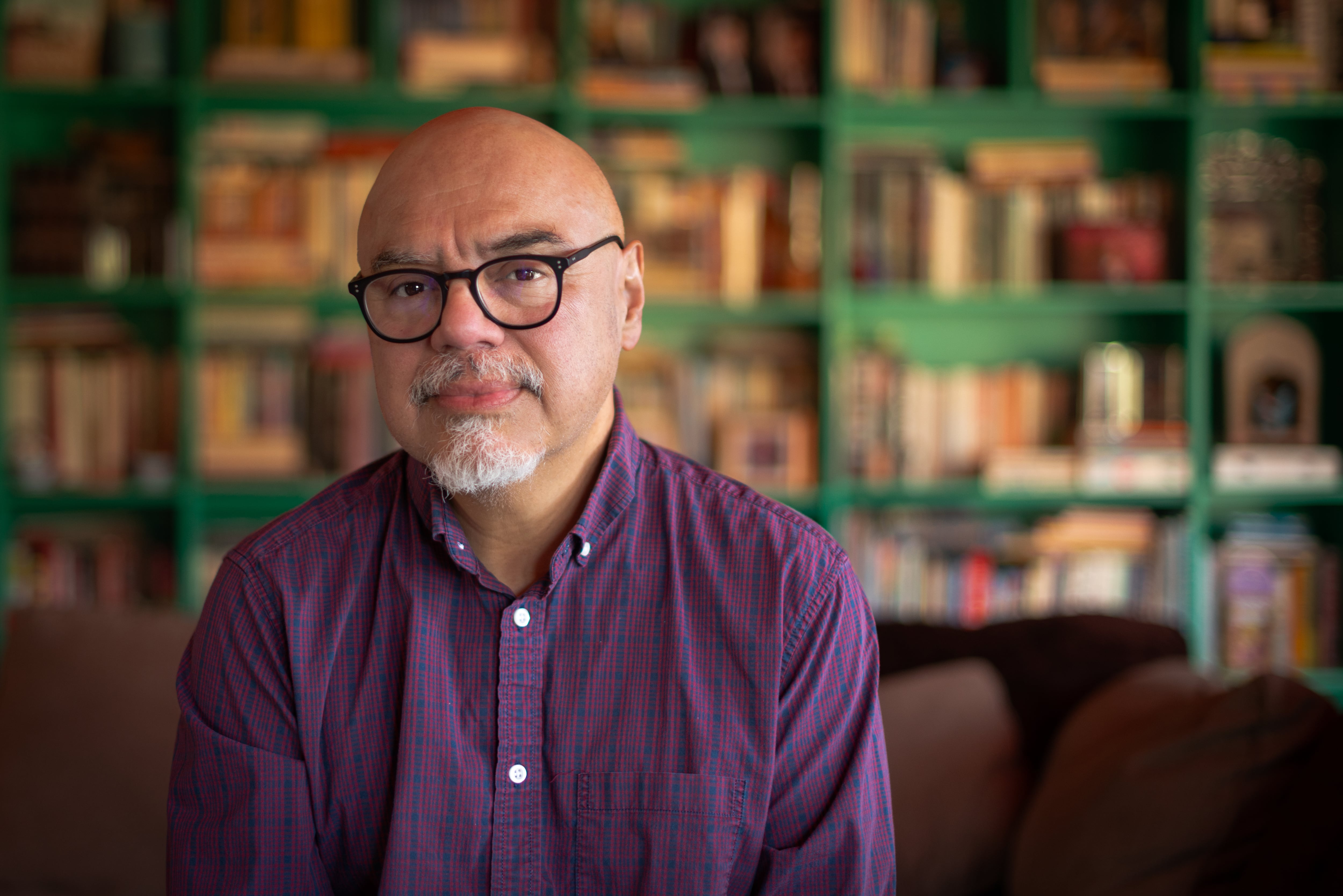 The writer Héctor Tobar, poses at his home in Los Angeles.