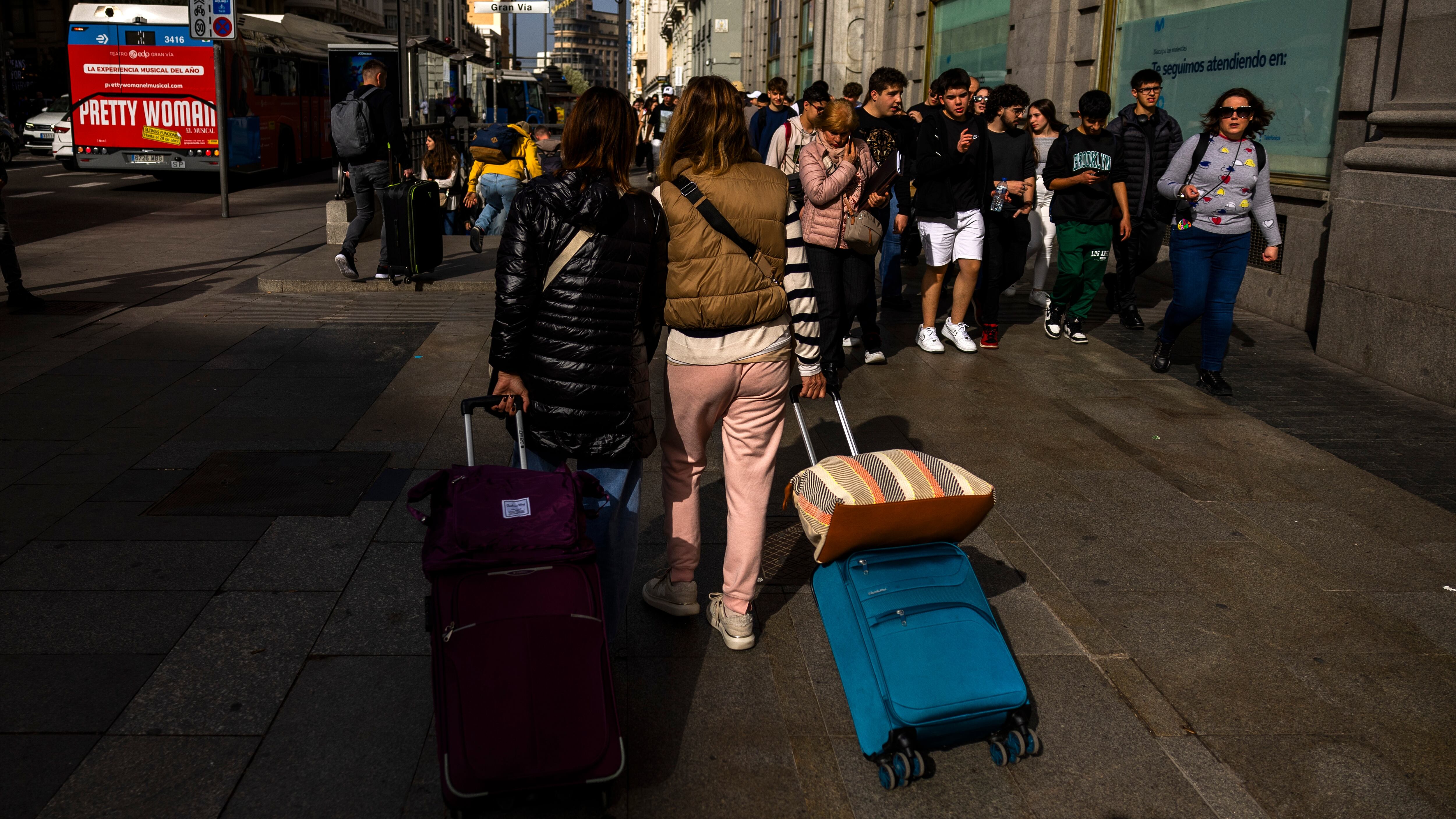 Tourists on Madrid's Gran Vía.