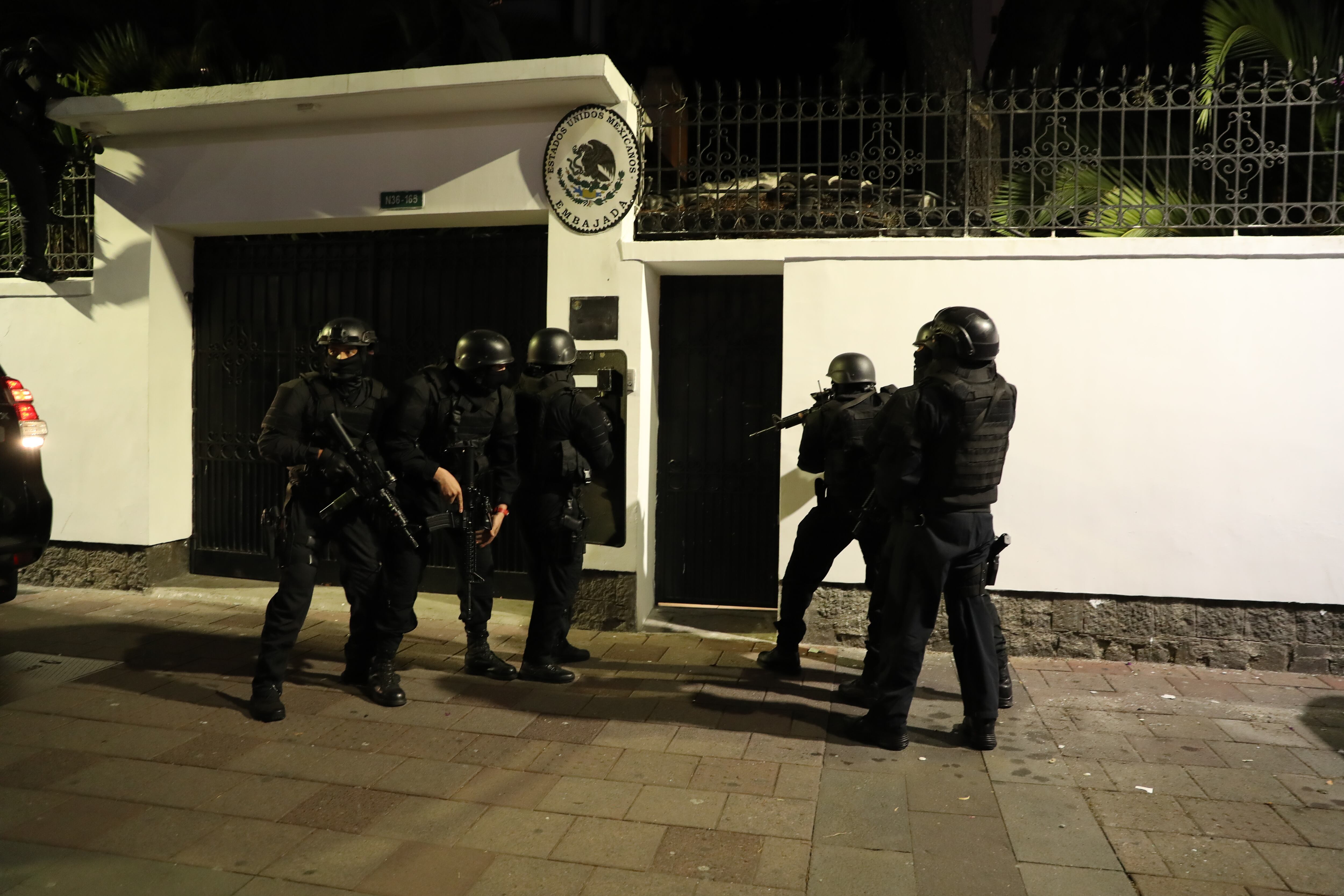 Members of an elite corps of the Ecuadorian Police moments before breaking into the Mexican Embassy in Quito.