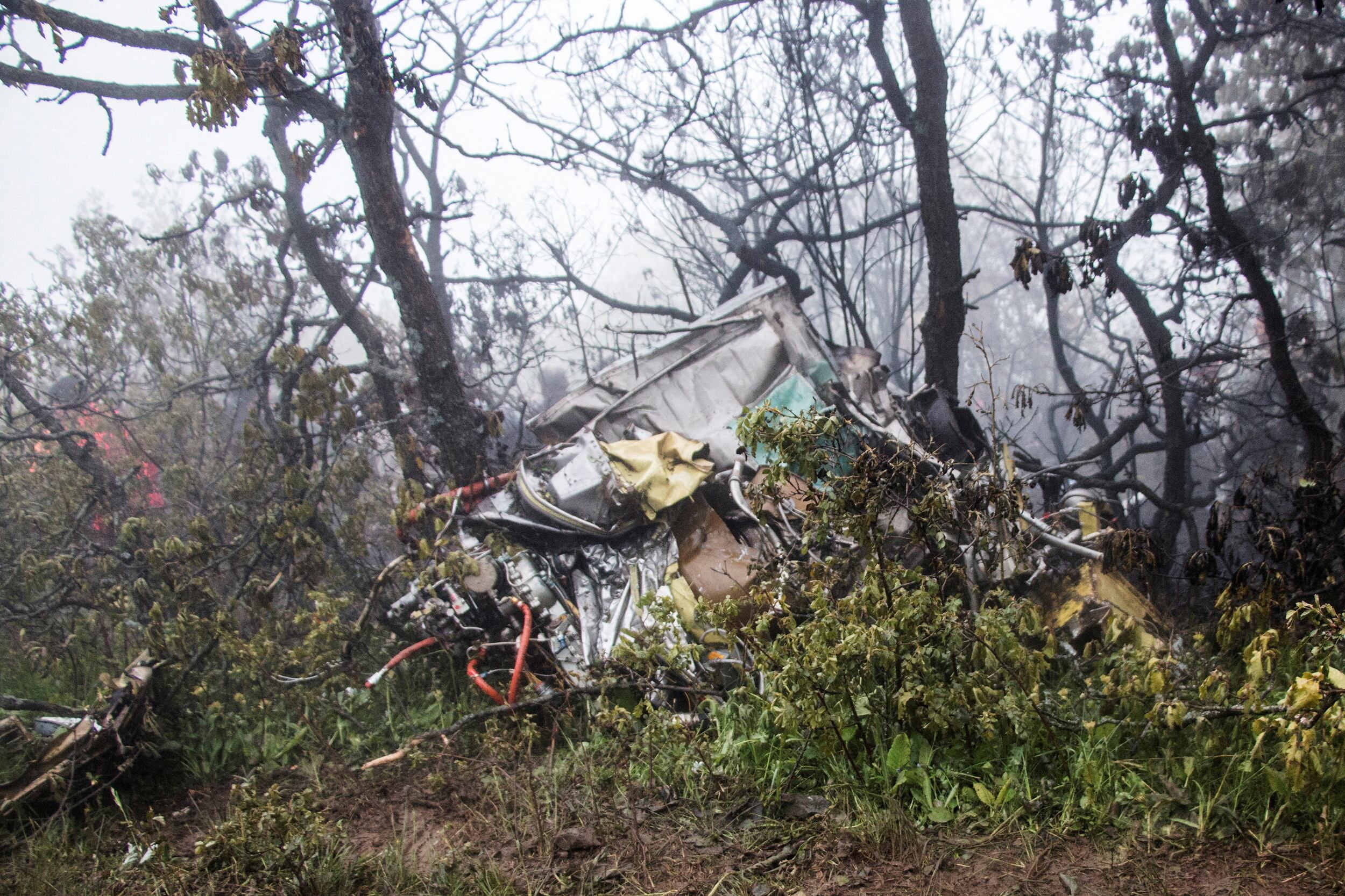 The remains of the helicopter in which the Iranian president, Ebrahim Raisi, was traveling.