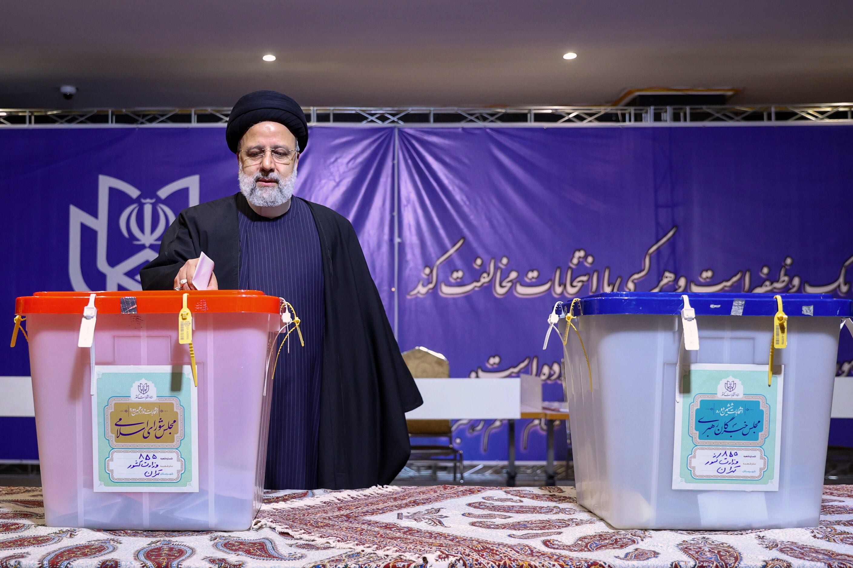 The Iranian president, Ebrahim Raisi, votes Friday in Tehran in the parliamentary elections.