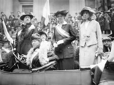 Prominent woman's suffrage advocates parade in an open car supporting the ratification of the 19th amendment granting women the right to vote in federal elections. (From left) W.L. Prendergast, W.L. Colt, Doris Stevens, and Alice Paul; c. 1910-15.