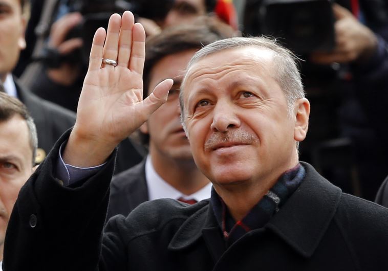 Turkish President Tayyip Erdogan greets his supporters (photo credit: REUTERS)