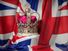 Royal golden crown with jewels on British flag. Symbols of United Kingdom. (British royalty, British monarchy)