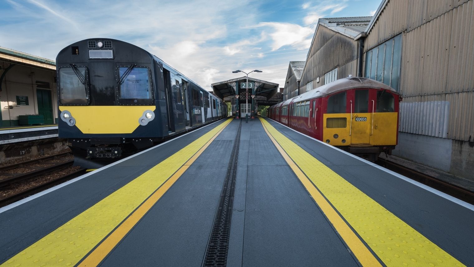 Class 484 and Class 483 trains standing side by side