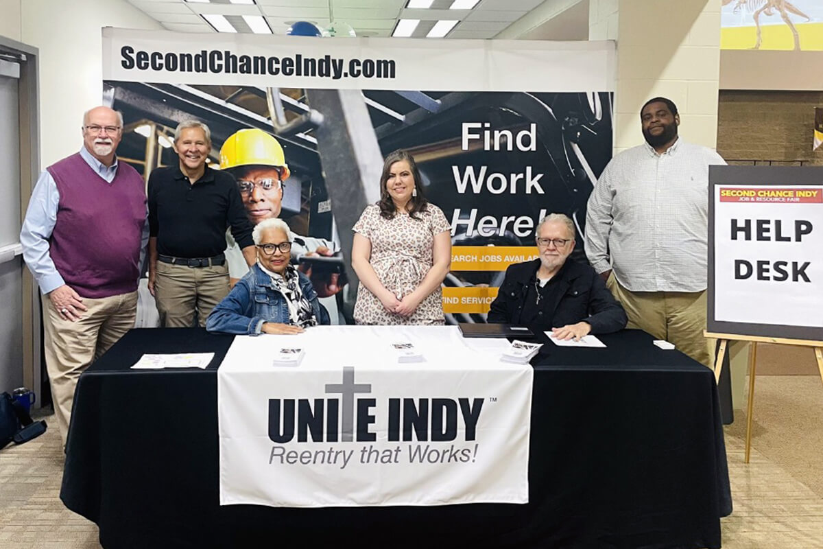 United Methodist Jim Cotterill, second from left, and others work at a booth at the Second Chance Indy Job Fair, which served more than 550 job seekers at Martin University in Indianapolis. Cotterill founded the 2nd Chance Indiana ministry, formerly Unite Indy, to help inmates prepare for life after release. 2023 file photo courtesy of 2nd Chance Indiana.