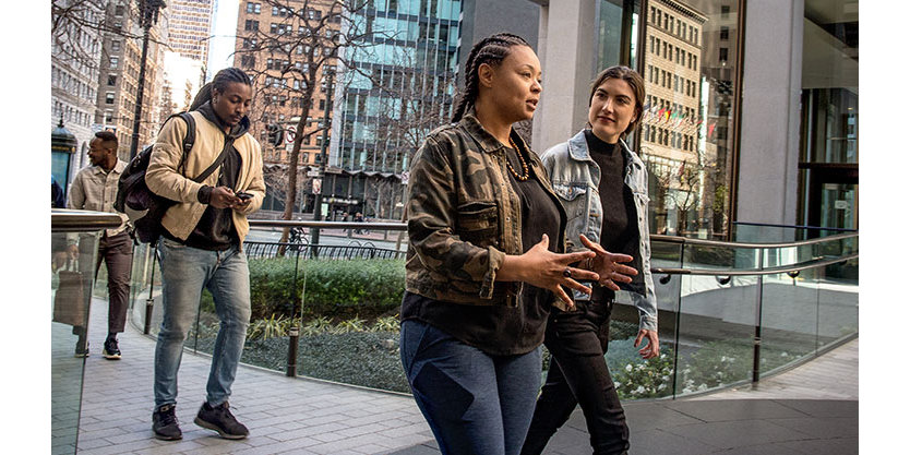 Group of people walking outside