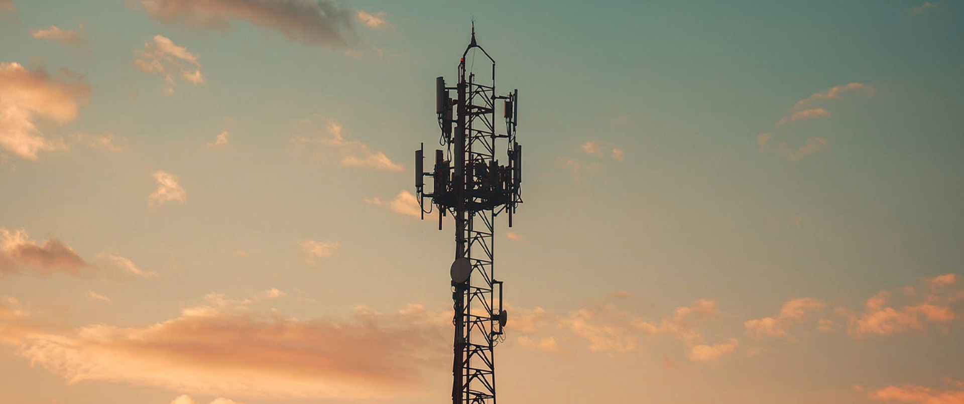 A mobile mast with sunrise in background