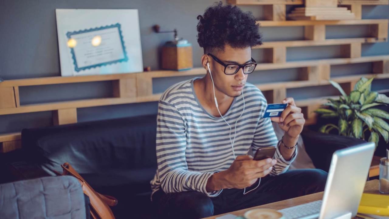 Young man working at home office