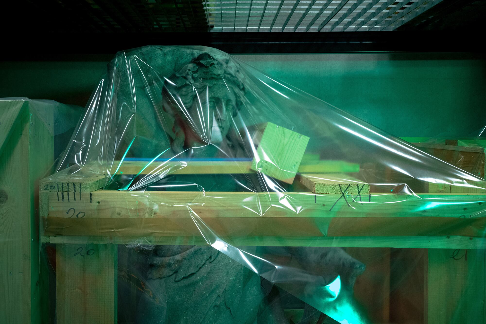 A sculpture rests in the Louvre’s conservation center in Liévin, France.