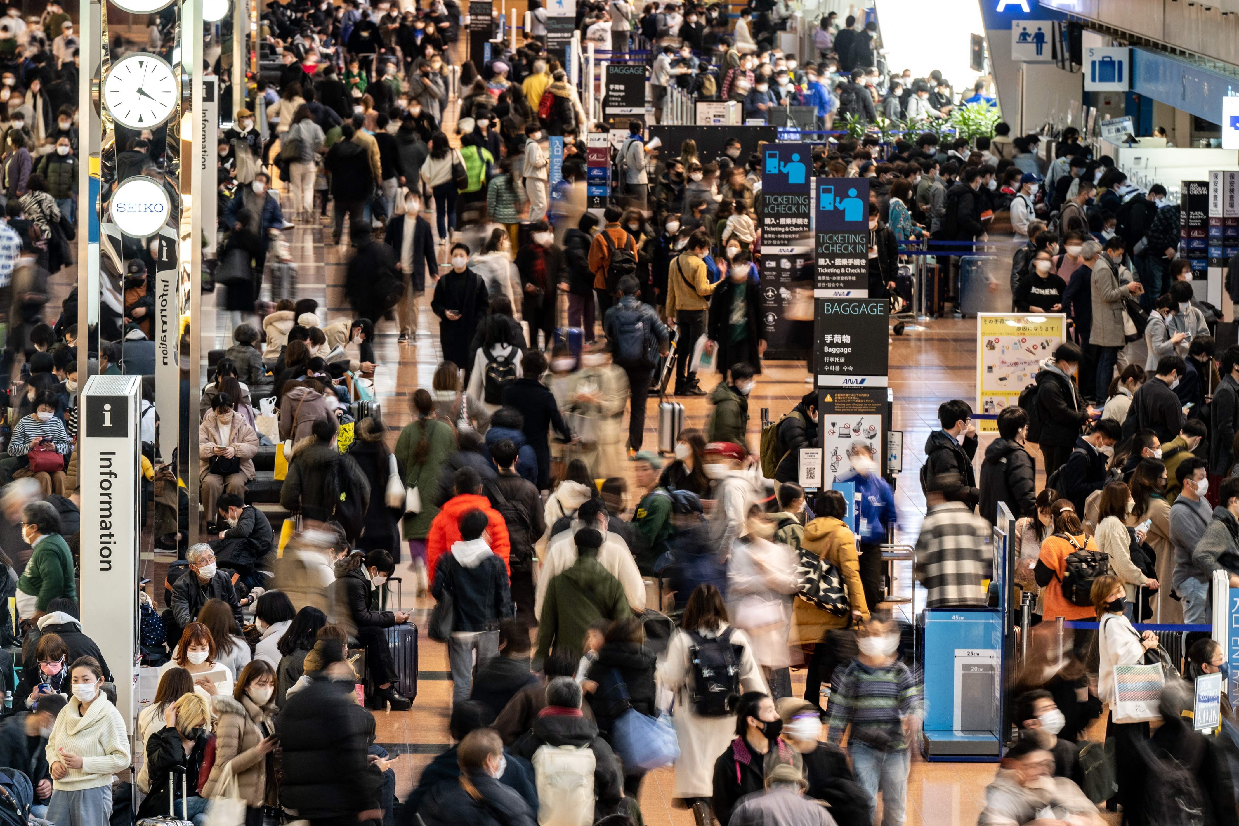 Travelers at Tokyo’s Haneda International Airport; December 29, 2022