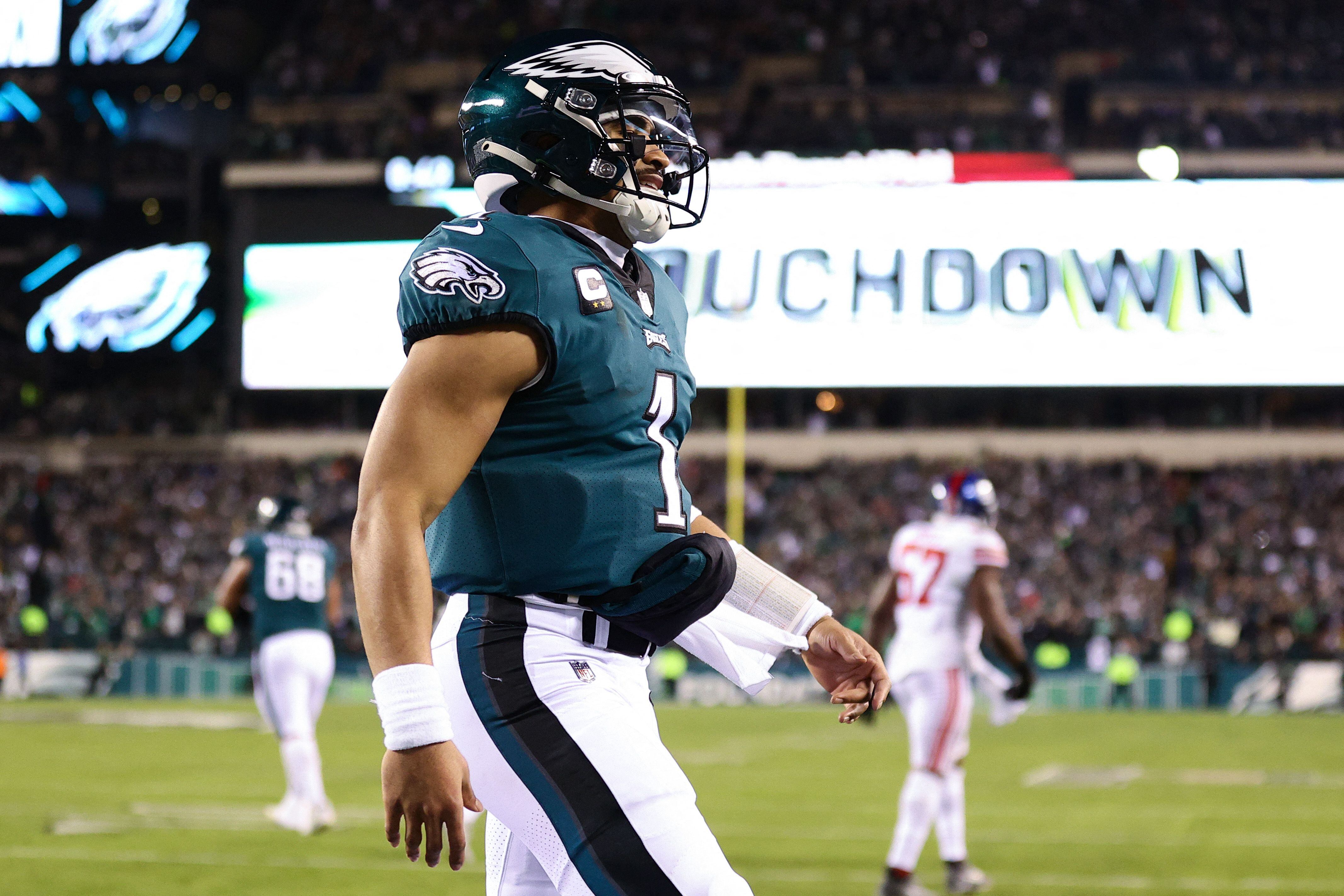 Jalen Hurts #1 of the Philadelphia Eagles celebrates after rushing for a touchdown against the New York Giants during the second quarter in the NFC Divisional Playoff game at Lincoln Financial Field on January 21, 2023 in Philadelphia, Pennsylvania.