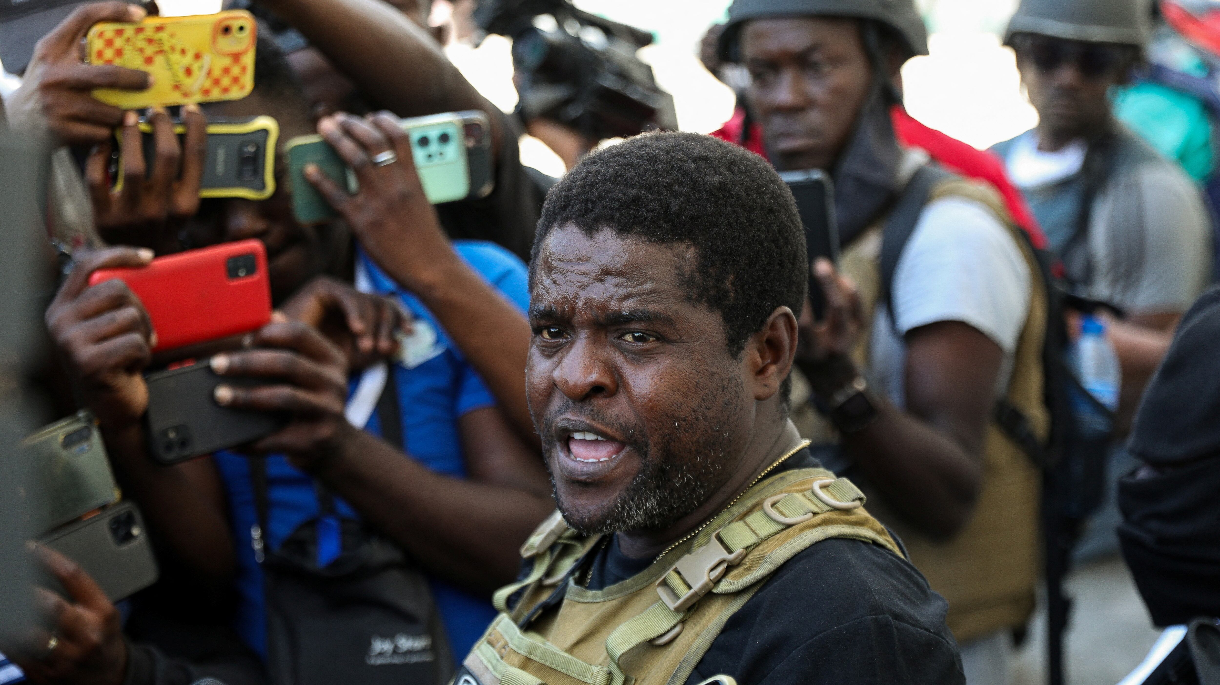 Jimmy Chérizier, alias Barbecue, speaks to the press in Port-au-Prince, March 5.