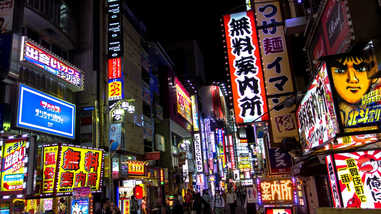Brightly-lit signs in an entertainment district of Japan.