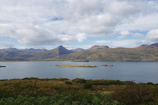 Landscape with a lake and hills in the distance