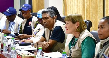 Commonwealth members attend a meeting