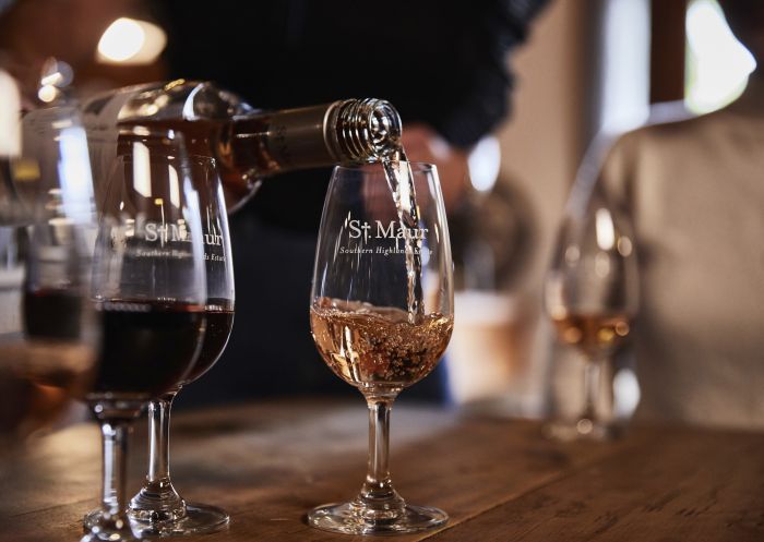 Wine being poured for tasting at St. Maur Wines in Exeter, Southern Highlands