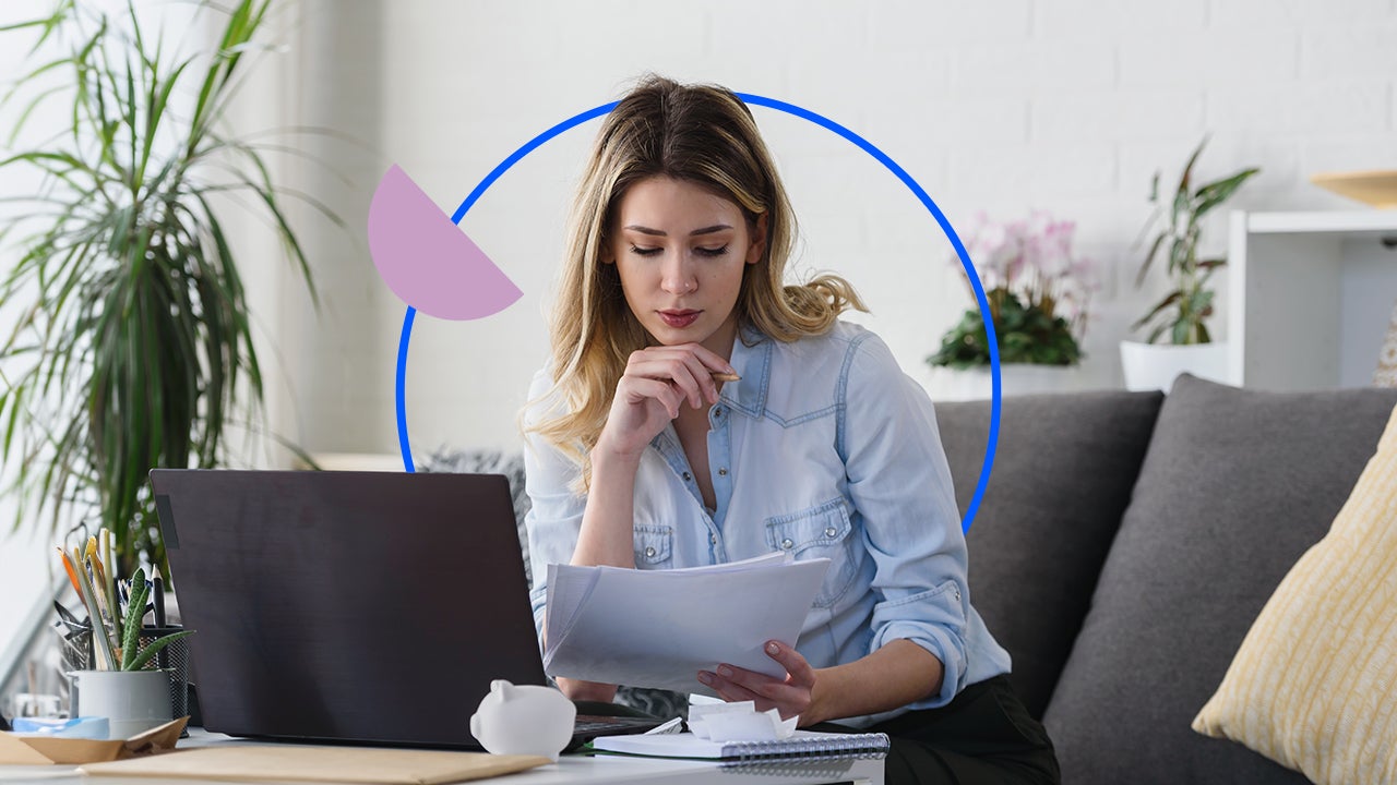 A woman reviewing documents