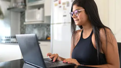 young woman using a laptop