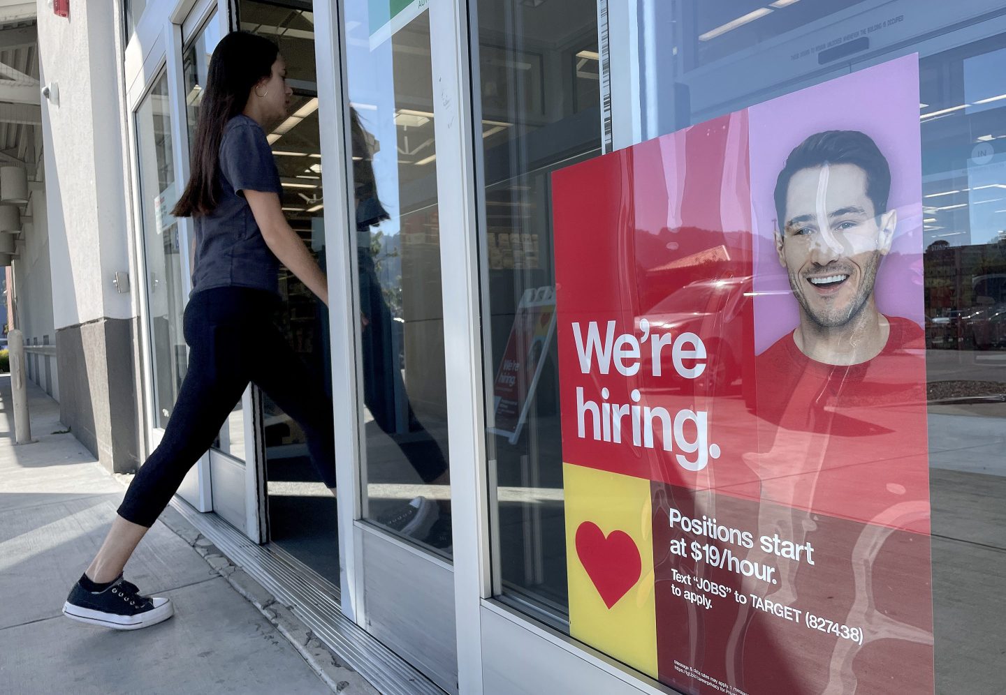SAUSALITO, CALIFORNIA &#8211; NOVEMBER 03: A customer walks by a now hiring sign posted in front of Target store on November 03, 2023 in Sausalito, California. According to a report by the Bureau of Labor Statistics, job growth slowed in October with a total of 150,000 new jobs added compared to analyst expectations of 180,000. The unemployment rate inched up to 3.9% from 3.8%. (Photo by Justin Sullivan/Getty Images)