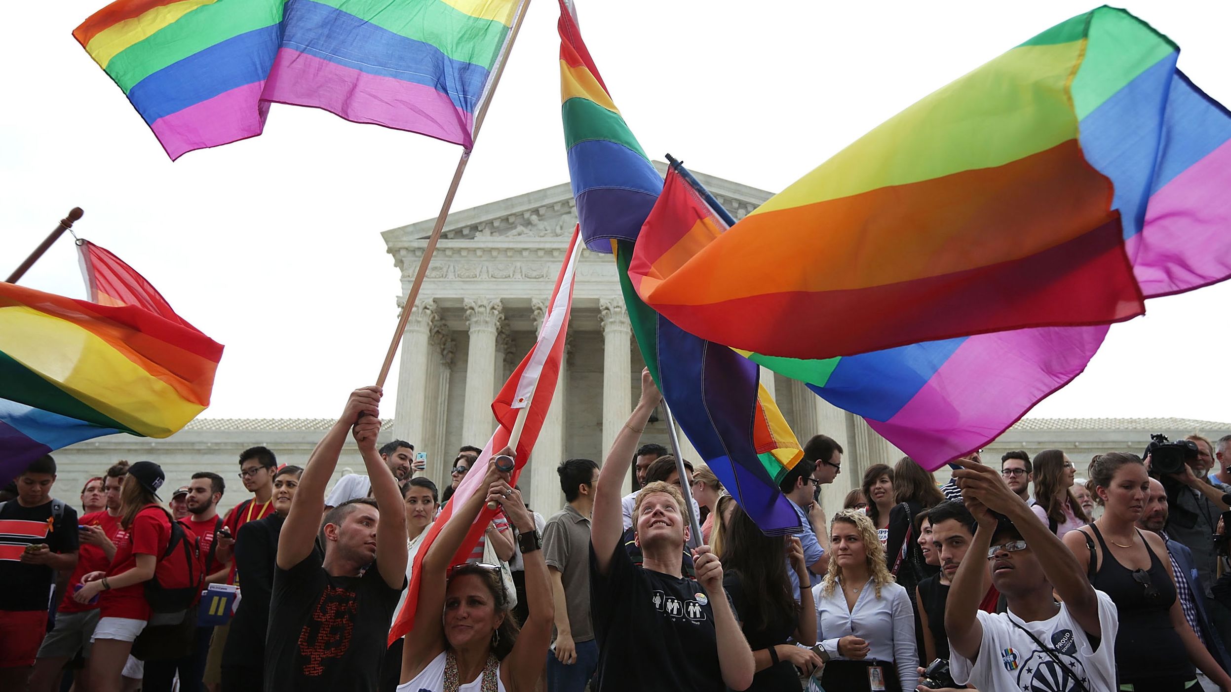 Supporters of same-sex marriage rejoice outside the Supreme Court in Washington, DC. after the U.S Supreme Court hands down a ruling regarding same-sex marriage, June 26, 2015. The high court ruled that same-sex couples have the right to marry in all 50 states.  (Photo by Alex Wong/Getty Images)