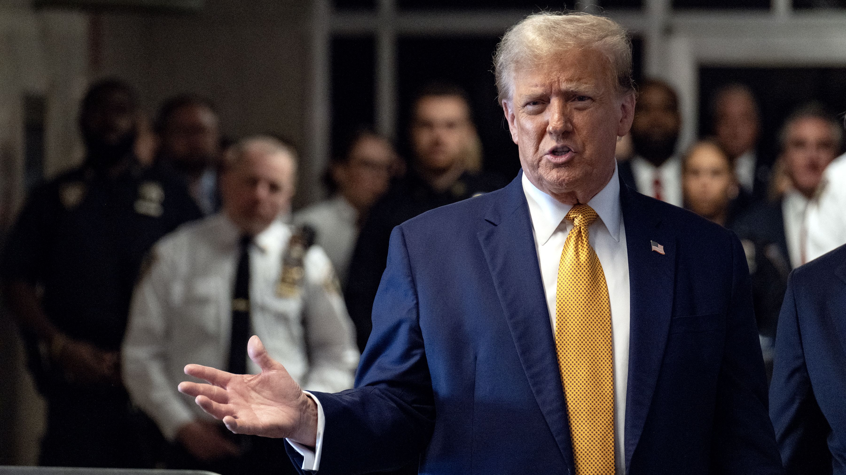 Former US President Donald Trump speaks to the press as he arrives to attend his trial for allegedly covering up hush money payments linked to extramarital affairs, at Manhattan Criminal Court in New York City, on May 14, 2024. Trump's former personal attorney Michael Cohen returns to the witness stand on Tuesday for what is expected to be a tough grilling by the ex-president's lawyers at his historic hush money trial. (Photo by Craig Ruttle / POOL / AFP) (Photo by CRAIG RUTTLE/POOL/AFP via Getty Images)